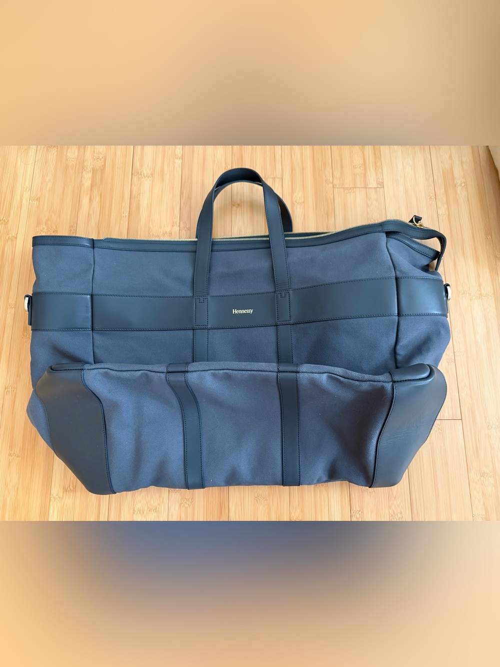 Brand new Hennessy Gray Canvas Duffel Bag with Leather Trim